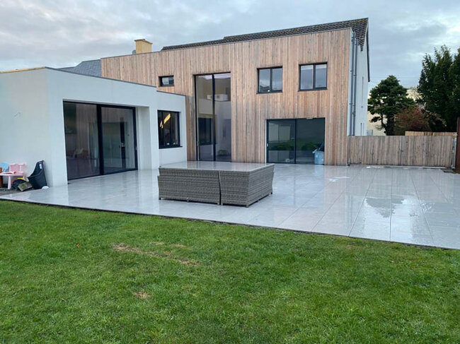 Finished terrace with pavers on the ground laid on adjustable pedestals solver