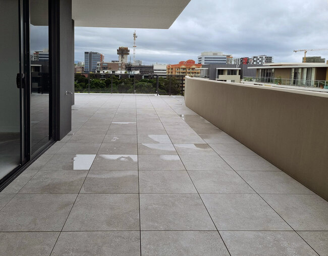 Large terrace with terrace pavers with a view