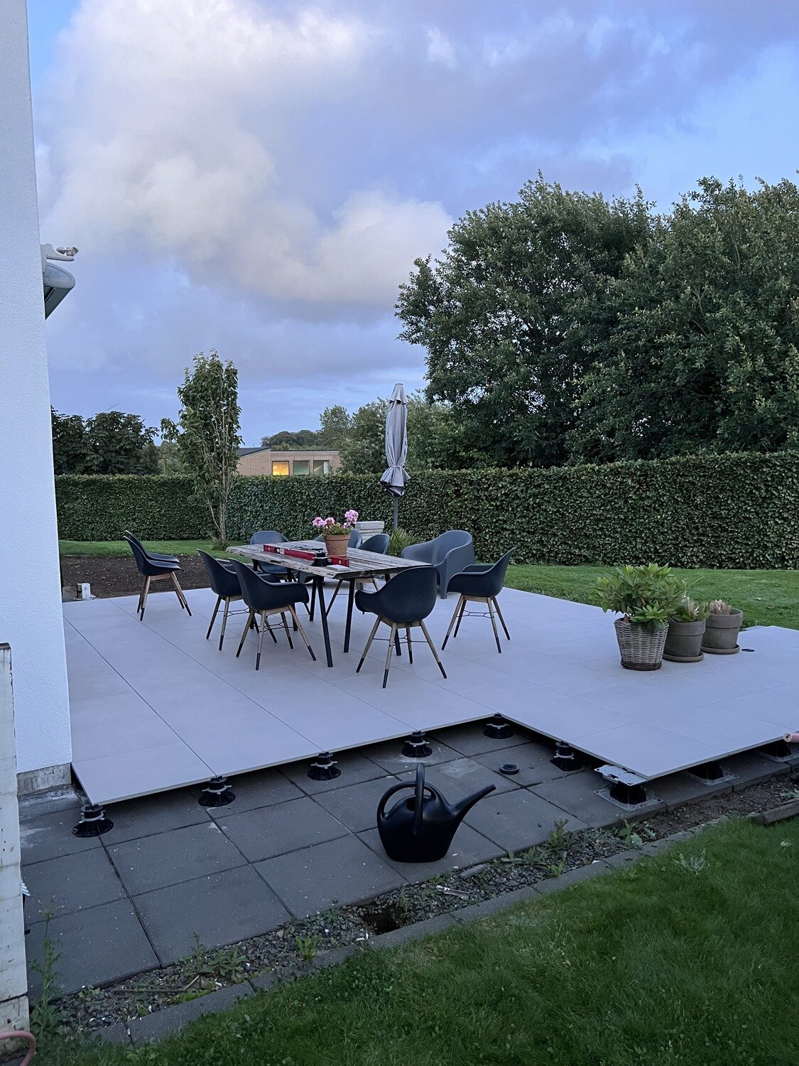 Modern terrace with ceramic tiles and a view of the lake