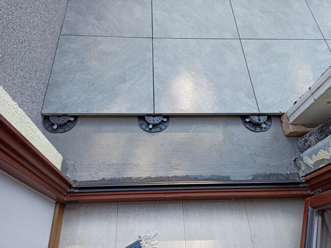 Baldosas de terraza sobre plots soporte
