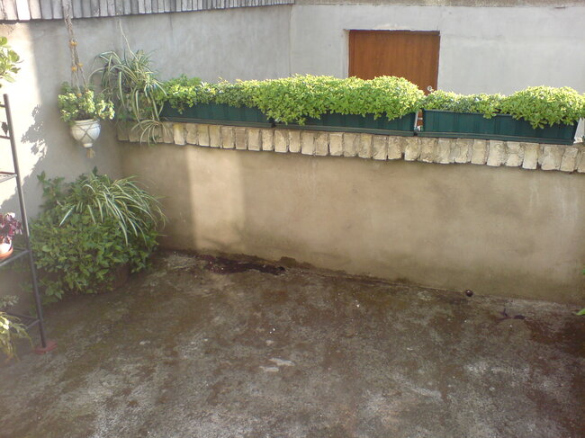 Antigua terraza de hormigón antes de la renovación
